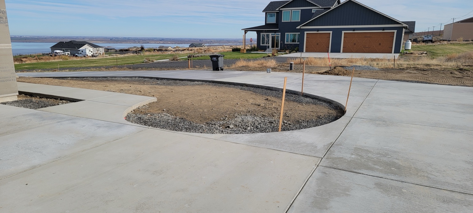 Circular concrete driveway and approach