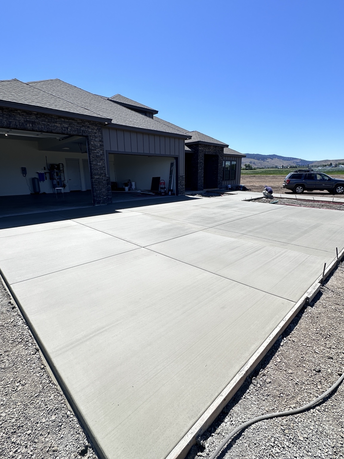 Custom home driveway and garage approach