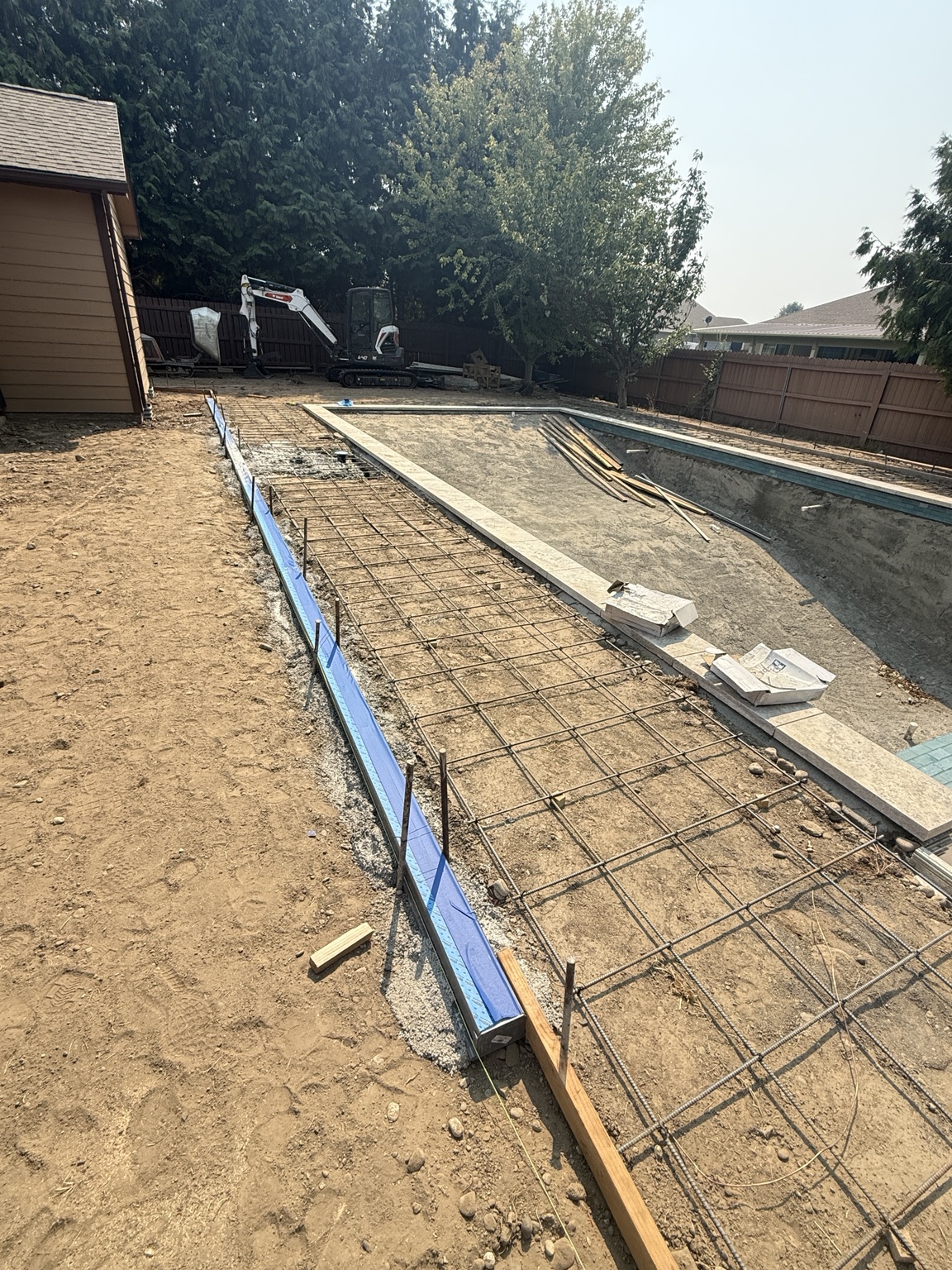Pool deck reinforcing preparation